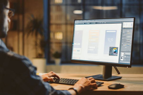 man using computer photo