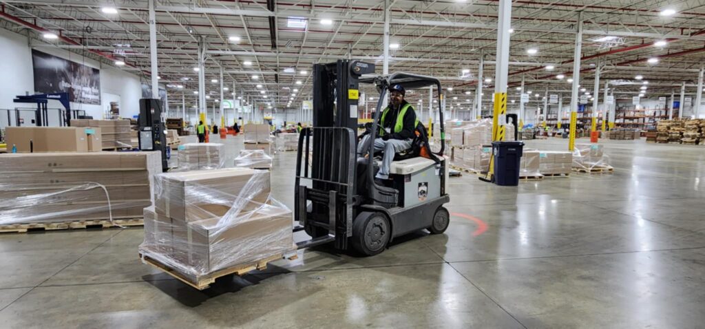 man driving forklift photo