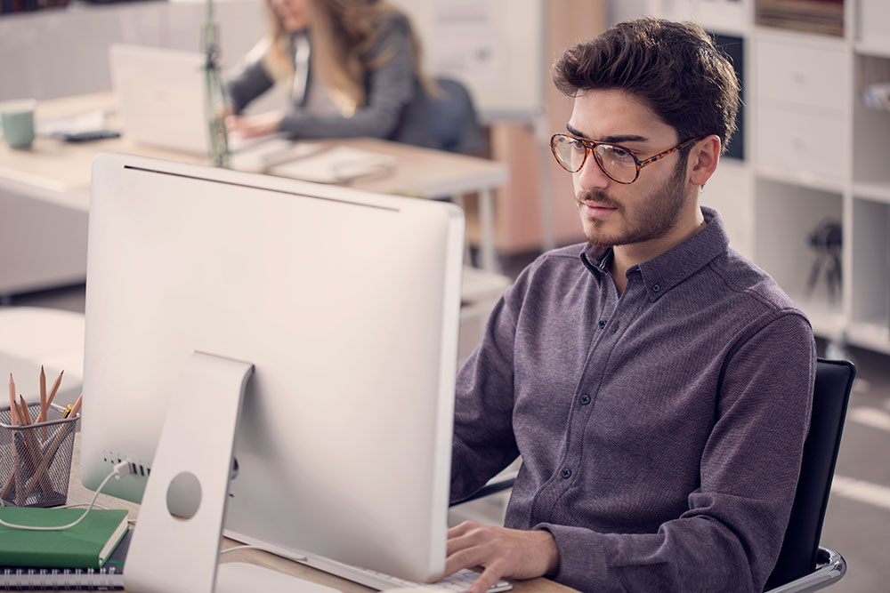 office worker using computer photo