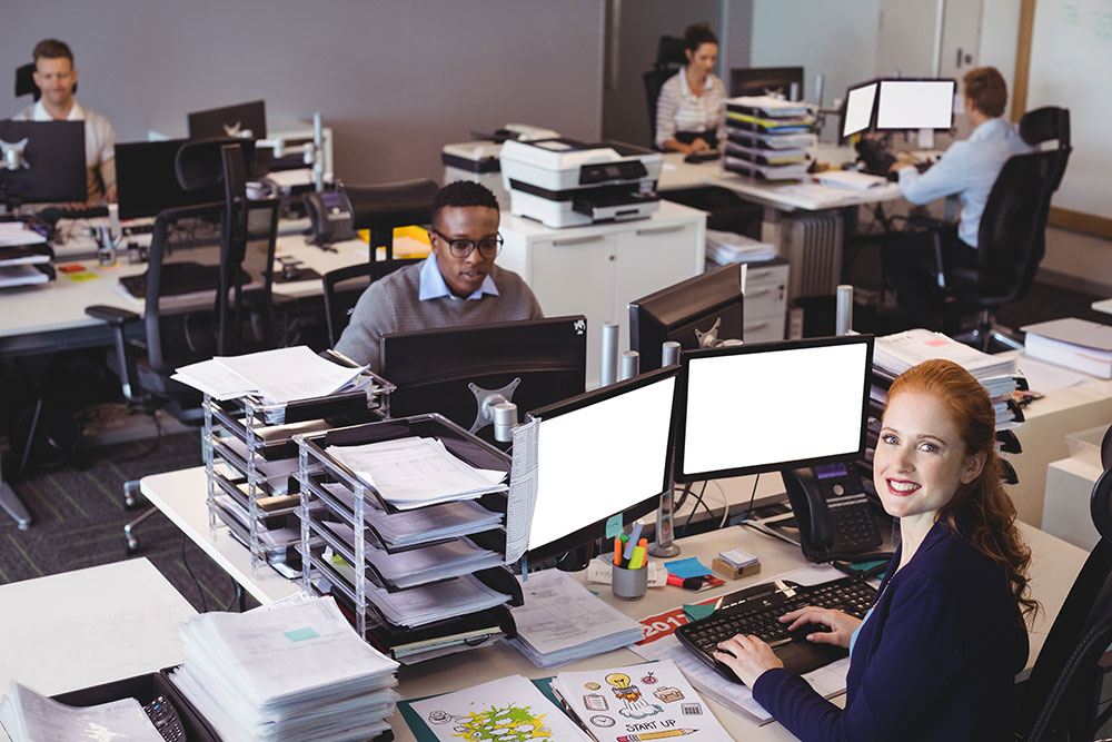 workers in an office photo