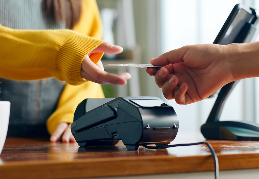 person paying with paycard photo