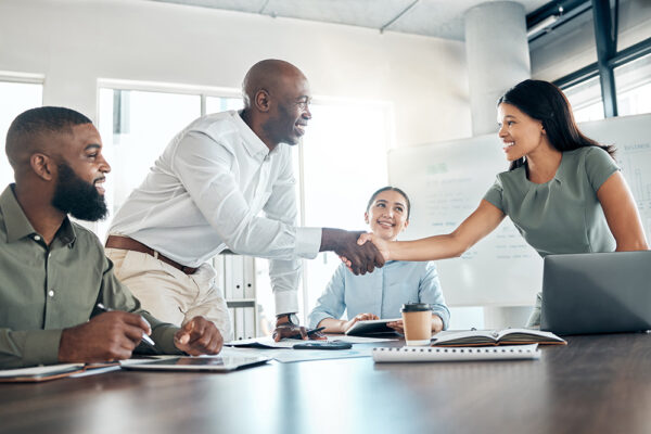 diverse workforce office shaking hands photo