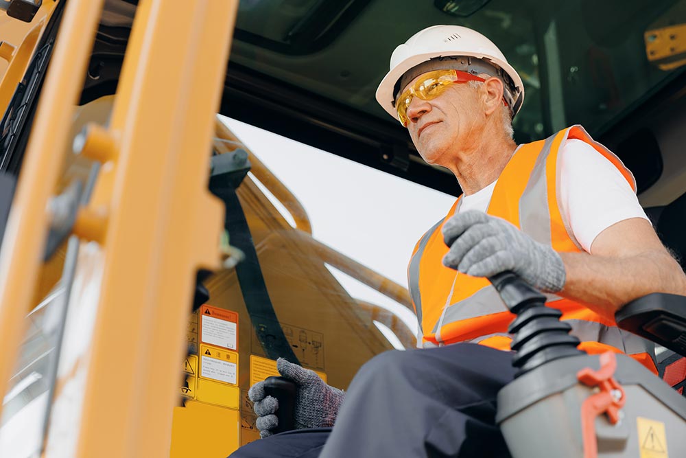 man operating crane photo